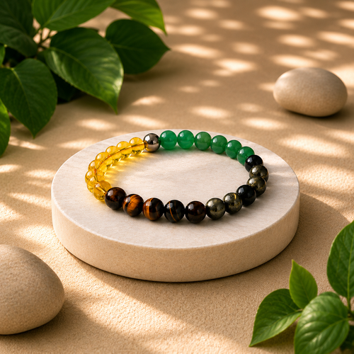 Beaded bracelet on a round stone surface with leaves and stones in the background
